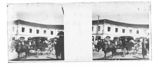 stereo glass slides; people in horse drawn wagon, building in backgrou