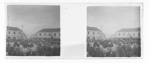 stereo glass slides; crowd on street blurry view