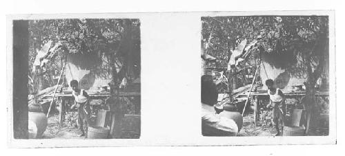 stereo glass slides; rural hut with woman in foreground