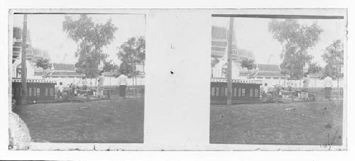 stereo glass slides; people crossing bridge into walled village