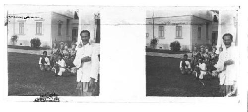 stereo glass slides; five children in traditional garb, adults in foreground