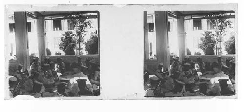 stereo glass slides; men in white uniforms, sailor hats seated on porch