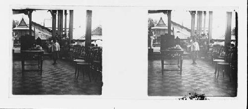 stereo glass slides; boy  wearing hat standing on porch, empty chairs on left