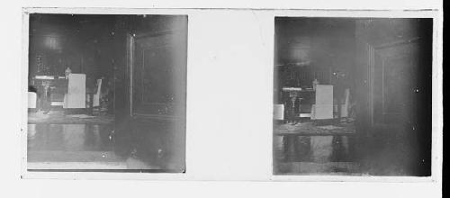 stereo glass slides; obscured view of interior of table and chairs