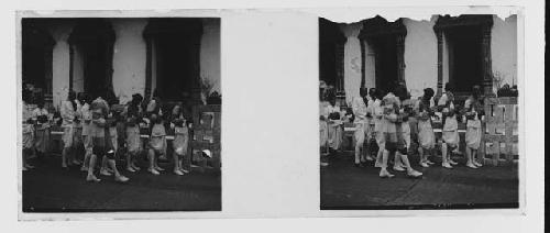 stereo glass slides; men in white uniforms in front of columned building