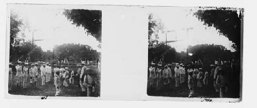 stereo glass slides; men in white uniforms standing in field