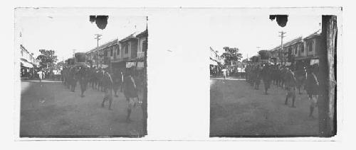 stereo glass slides; men marching on street