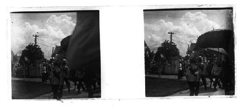 stereo glass slides; men marching in decorative uniforms