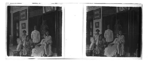 stereo glass slides; four women andone man posed in western dress on porch