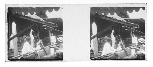 stereo glass slides; man with camera with men in boat in foreground