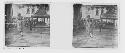 stereo glass slides; men in capes walking to street gathering