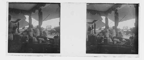 stereo glass slides;uniformed men in outdoor shelter overlooking activities