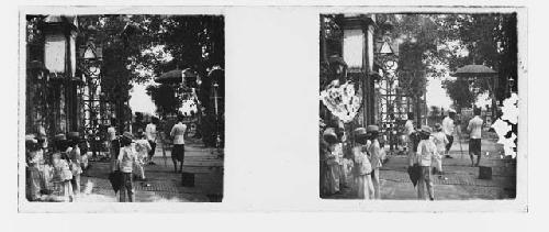 stereo glass slides; boys in white jackets, photographer in background