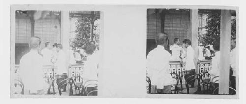 stereo glass slides; men in white coats setting up on porch