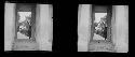 stereo glass slides; person looking in doorway toward camera