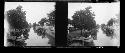 stereo glass slides; river boats in canal moored at village