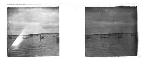 Stereo glass slides of Siam; boats moored in water