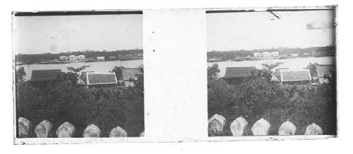 Stereo glass slides of Siam; village scene next to water