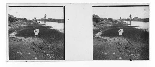 Stereo glass slides of Siam; shoreline of River with flower in foreground