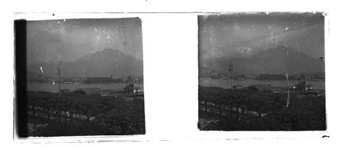 Stereo glass slides of Siam; landscape of village and river; mountain