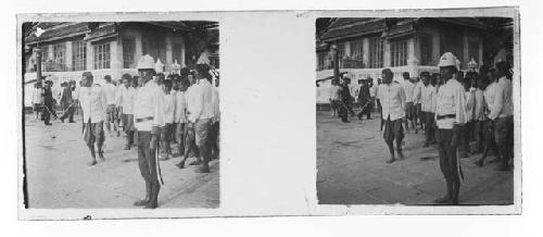 Stereo glass slides of Siam; men on street