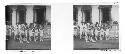 Stereo glass slides of Siam: Men in tradtional garb on walking outside building