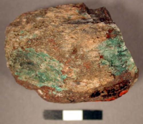 Mineral nodule. green, used for pigment. irregular cylindrical block. copper car