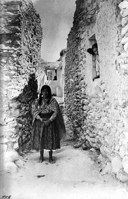 Hopi woman standing in the street in Sichumuavi