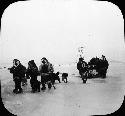 Group Traveling With Huskies and Sled.