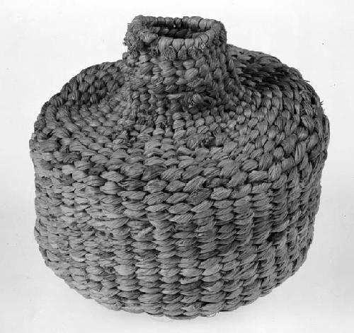 Bottle shaped basket made of corn husk (iriquois:seneca)