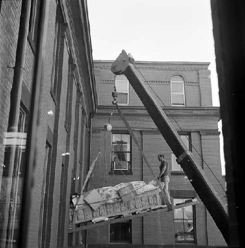 Removal of cast of Stela A from Peabody Museum