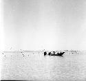 People on and around a boat on Indus river at Pattan Ferry