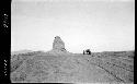 Rock formation, people traveling viewed from a distance