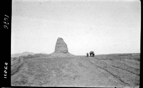 Rock formation, people traveling viewed from a distance