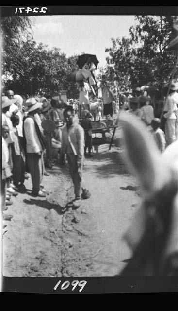 People gather to watch a parade(?)