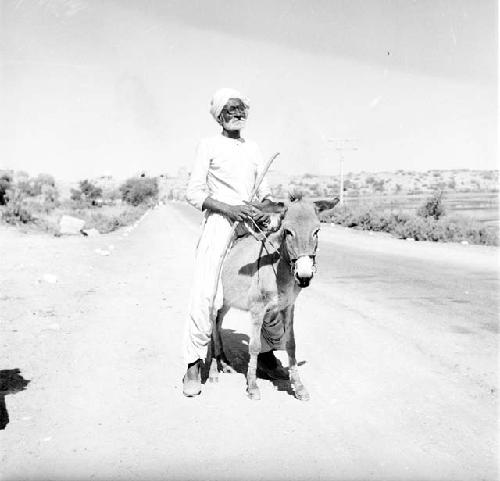 A man sits on an animal, Pattan Ferry