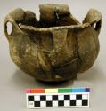 Ceramic vessel, mended, 4 handles, flared & dentate rim, cord impressed body