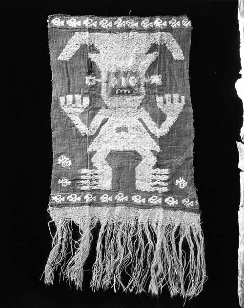 Unidentified Peruvian textile, woven human figure and fringe