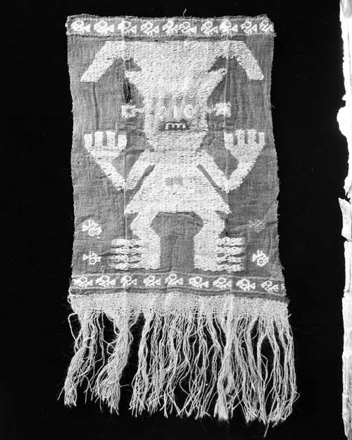 Unidentified Peruvian textile, woven human figure and fringe