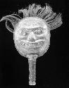 Shaman's Copper Rattle depicting face of owl and woman