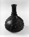 Black jug with alternating spiral, plain and rough areas