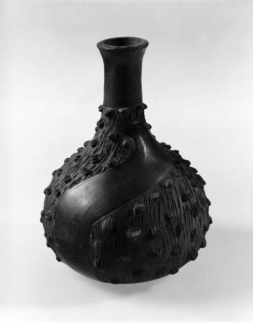 Black jug with alternating spiral, plain and rough areas