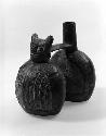 Stirrup pot with cat effigy