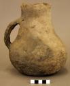 Ceramic pitcher with one handle, plain, straight neck, flat base