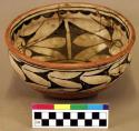 Ceramic bowl, polychrome exterior, steep walls, flat base, mended
