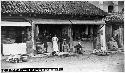 Four storefronts displaying basketware