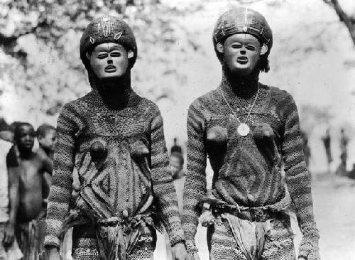 Two Likishi dancers in costume