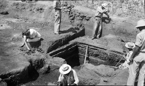 Workers excavating