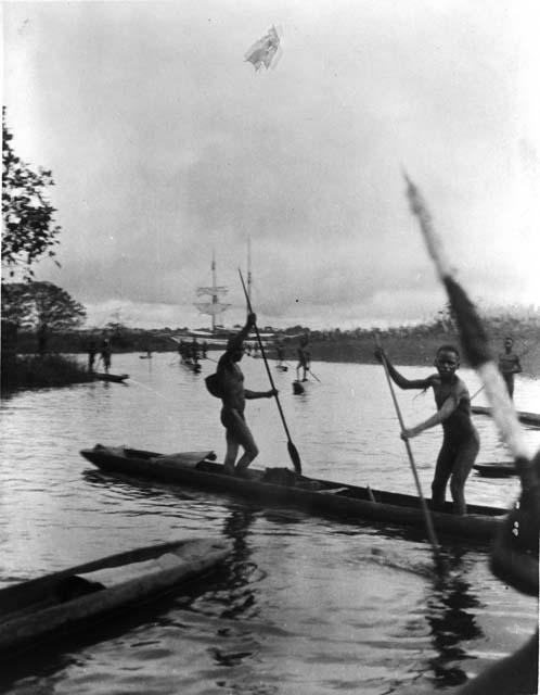 People in canoes