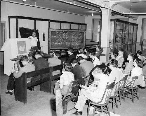 F.H. Douglas and class in Peabody Museum